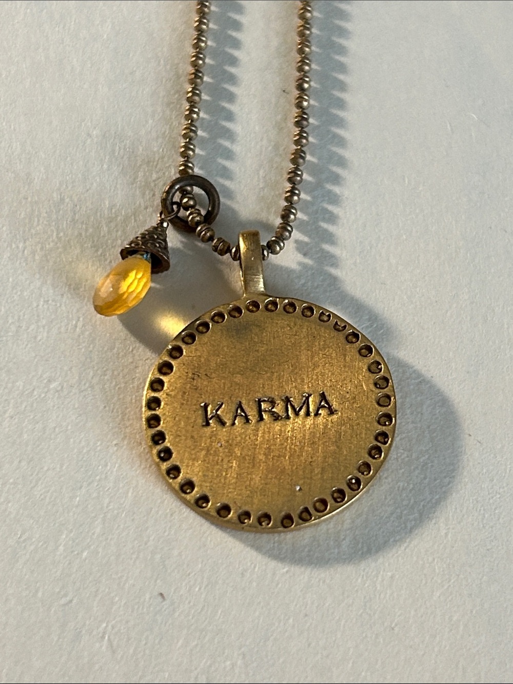 Karma pendant